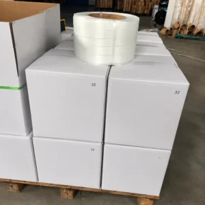 32mm polyester composite strapping roll in white export carton box stacked on pallet for shipment