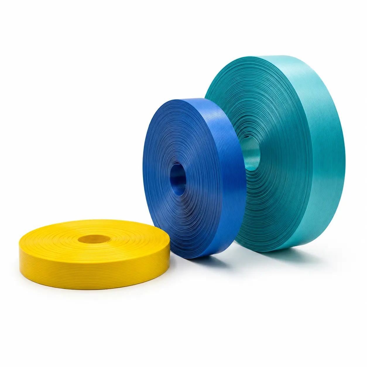 Multiple color polyester composite strapping rolls for heavy duty cargo securing applications