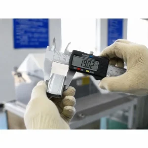 Precise width dimension measurement of a galvanized steel seal using a digital caliper