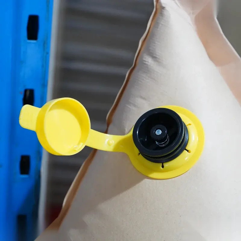 PP laminated dunnage air bag valve detail showing inflation port for cargo protection.