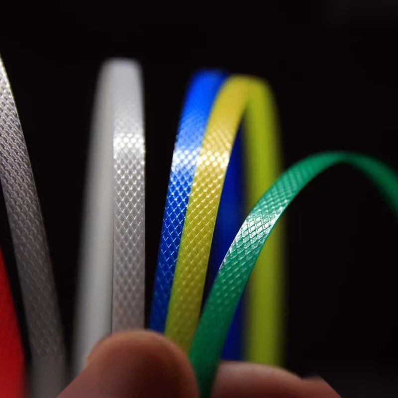 Colored PP strapping bands for palletizing and packaging applications